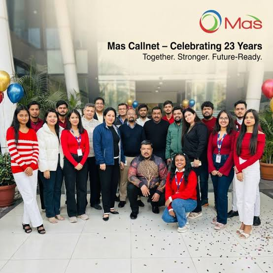 Mas Callnet team celebrating an anniversary together